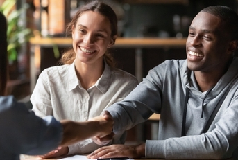 Couple meeting a lender