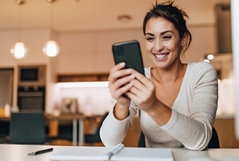 Smart woman looking at her phone