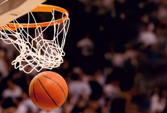 scoring the winning points at a basketball game