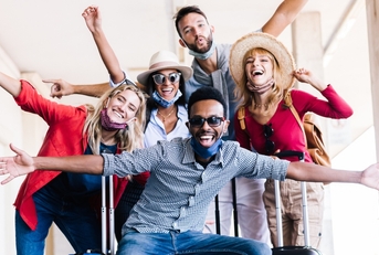 Group of friends having fun in an airport