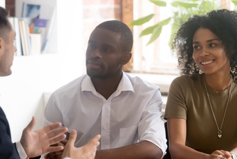Couple meeting with insurance agent