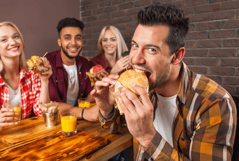 Friends eating burgers