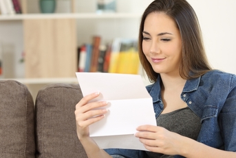 Woman reading a letter