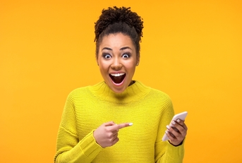 Happy African American woman with phone