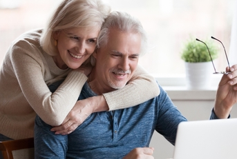 Couple looking at computer