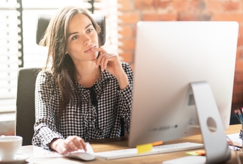 Woman looking at computer