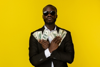 man holding a lot of cash