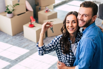 Happy homeowner couple