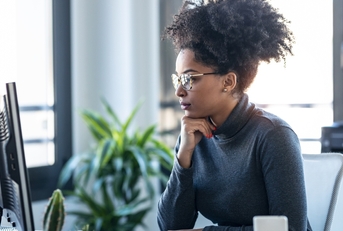 Woman looking at computer