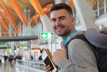 Smiling man at airport