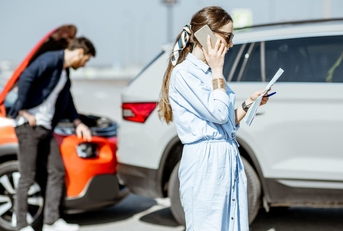 Woman calling road assistance 
