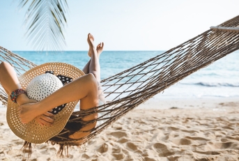 traveler asian woman relax in hammock