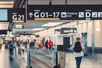 Travelers going to airport gate