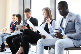 stressed applicants waiting for job interview