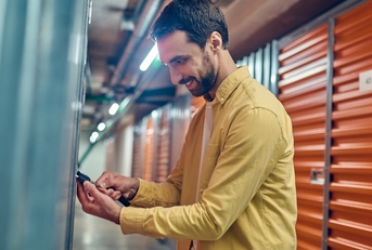 Man opening storage unit