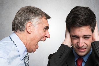 angry businessman shouting to an employee