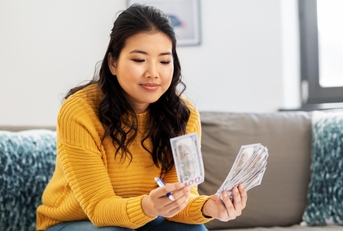 woman counting money
