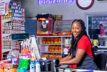 woman cashier at supermarket