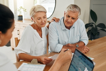 financial advisor consultation with clients on retirement