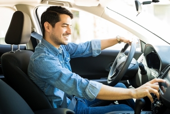 Young man driving a car