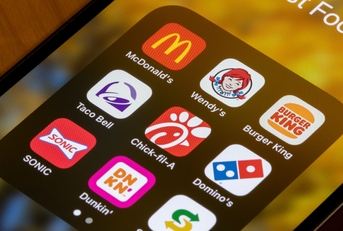 american fast food restaurant apps are seen on an iPhone