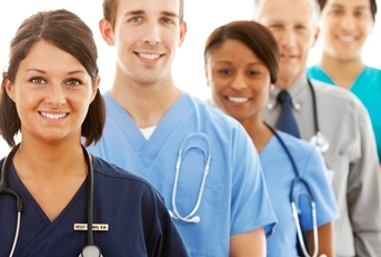 Several nurses standing in line