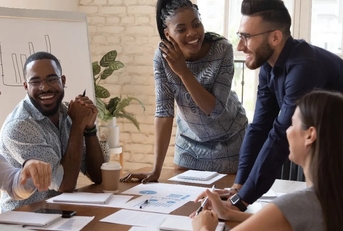 multi ethnic team working in office