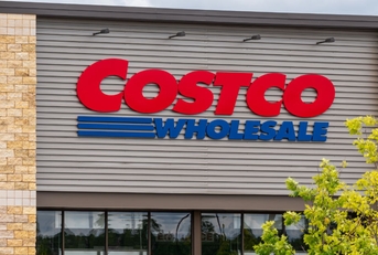 costco wholesale logo outside costco store during day time with clear sky