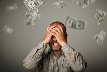frustrated man and falling dollars