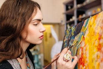 painter paints in her studio