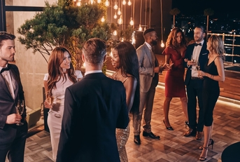 people in formal wear on a party