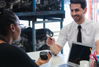 A man using a business credit card