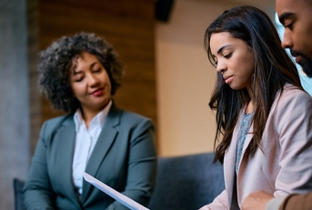 couple going through their financial reports on meeting
