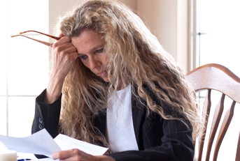 woman worried about bills