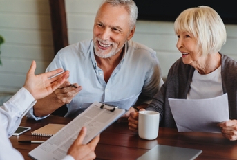 Senior couple opening a bank account