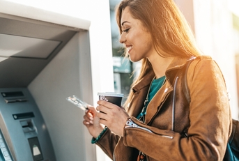 Woman using an ATM