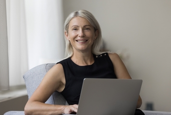 mature freelance businesswoman working from home