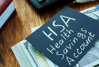 health savings account note on a diary