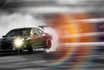 A stylized photo of a racing car. 