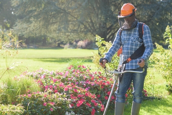landscaper working on yard