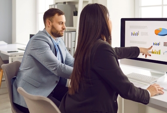 business people discussing data at work