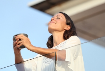 Adult woman with coffee cup