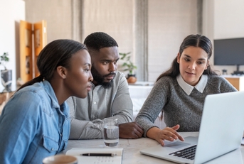 couple listening to their financial planner