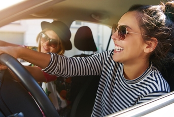 Friends driving in a car