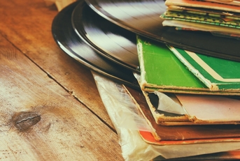 vintage records on wooden table