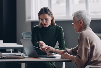 confident financial advisor discussing options