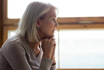 mature woman mourning