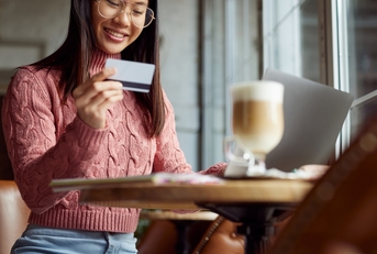 Woman using a debit card