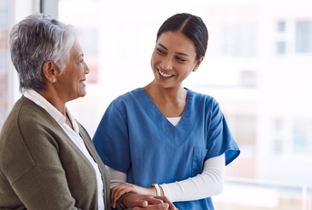 caregiver with senior woman