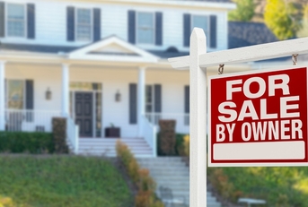 for sale sign outside house